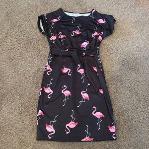 Woman’s flamingo dress